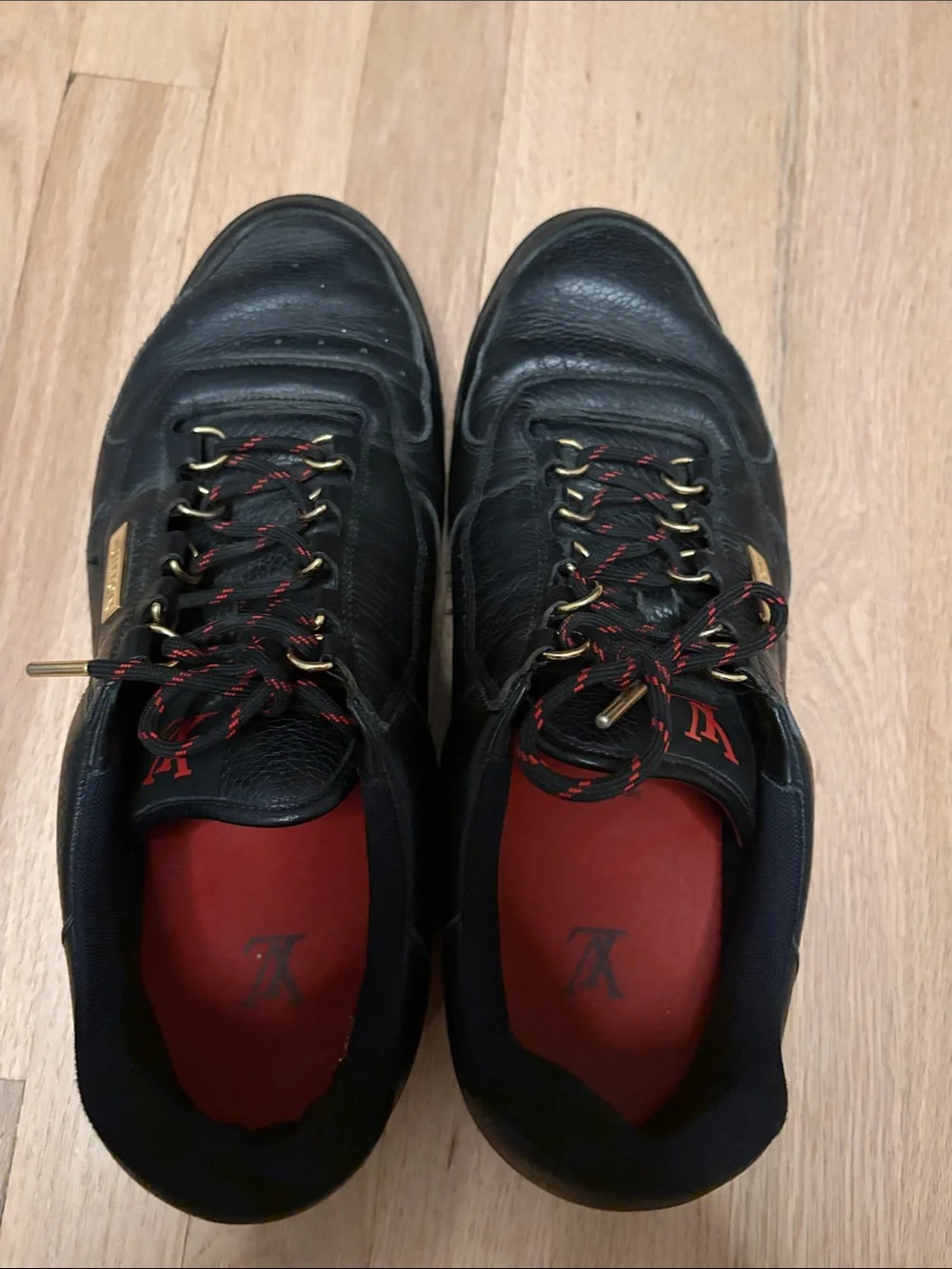 Louis Vuitton Black Leather Men's Sneakers with Red Insoles and Gold Accents